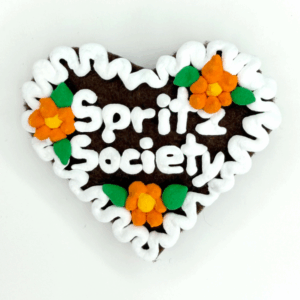 Original Münchner Wiesn-Filzherz "Spritz Society" - weißer Rand, orange Blumen