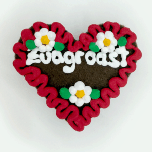 Original Münchner Wiesn-Filzherz "Zuagroast" - rubinroter Rand, weiße Blumen