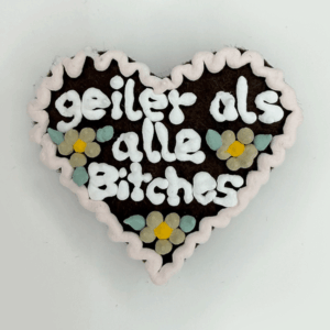 Original Münchner Wiesn-Filzherz "geiler als alle Bitches" - hellrosaner Rand, beige Blumen